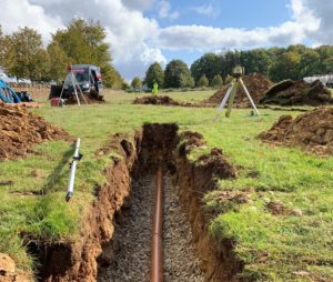 Drainage pipework in a gravel lined trench